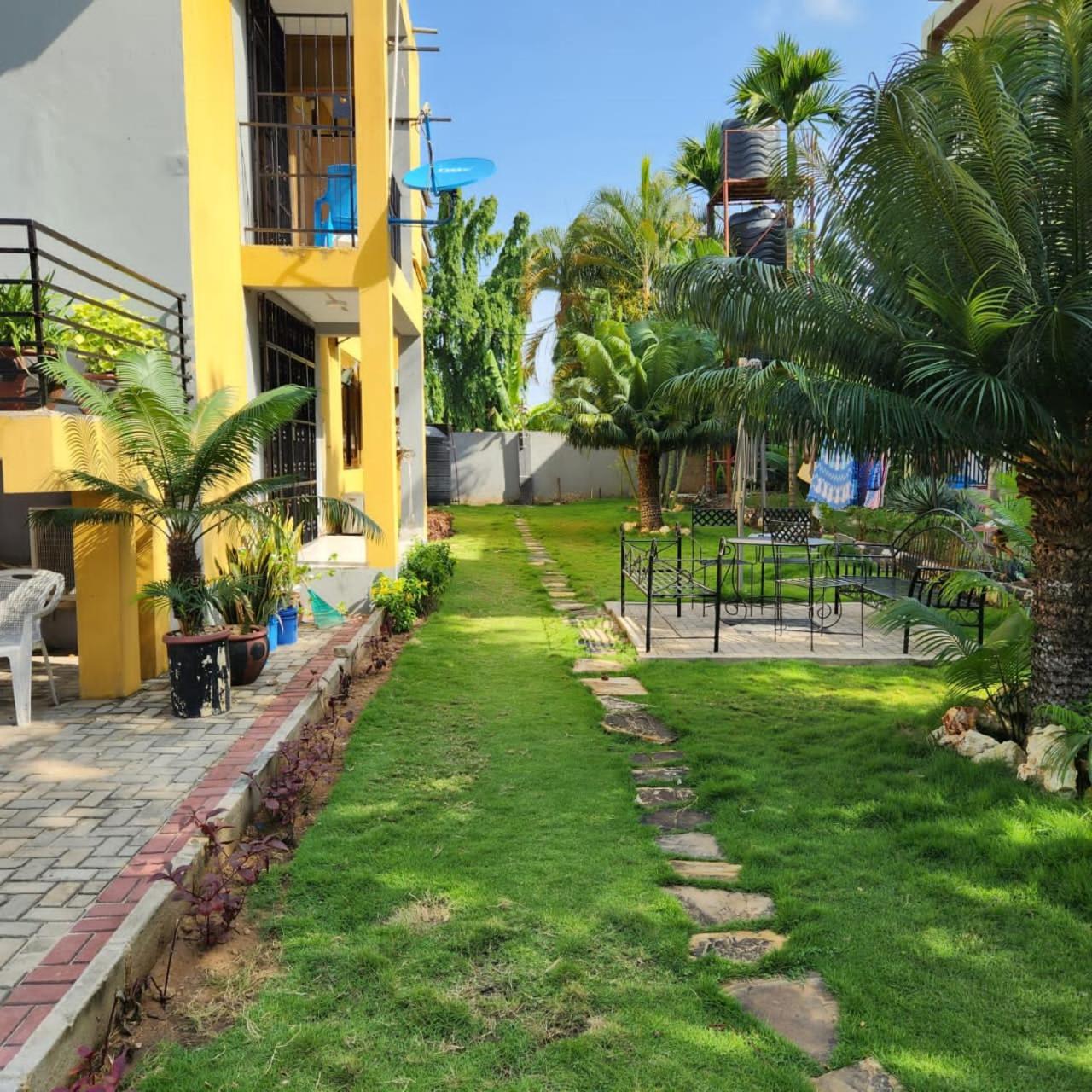 Len Apartments Daressalam Exterior foto